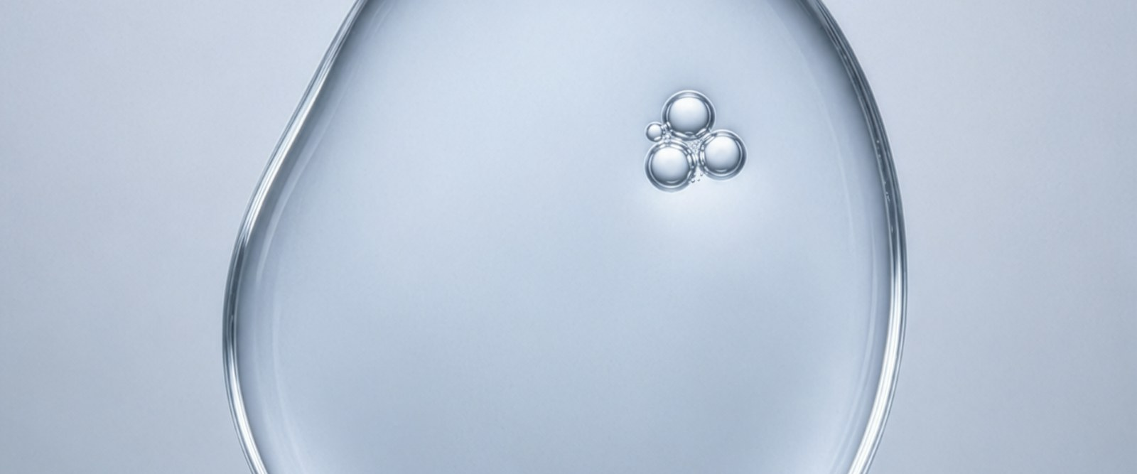 Close-up of a clear secretome serum drop